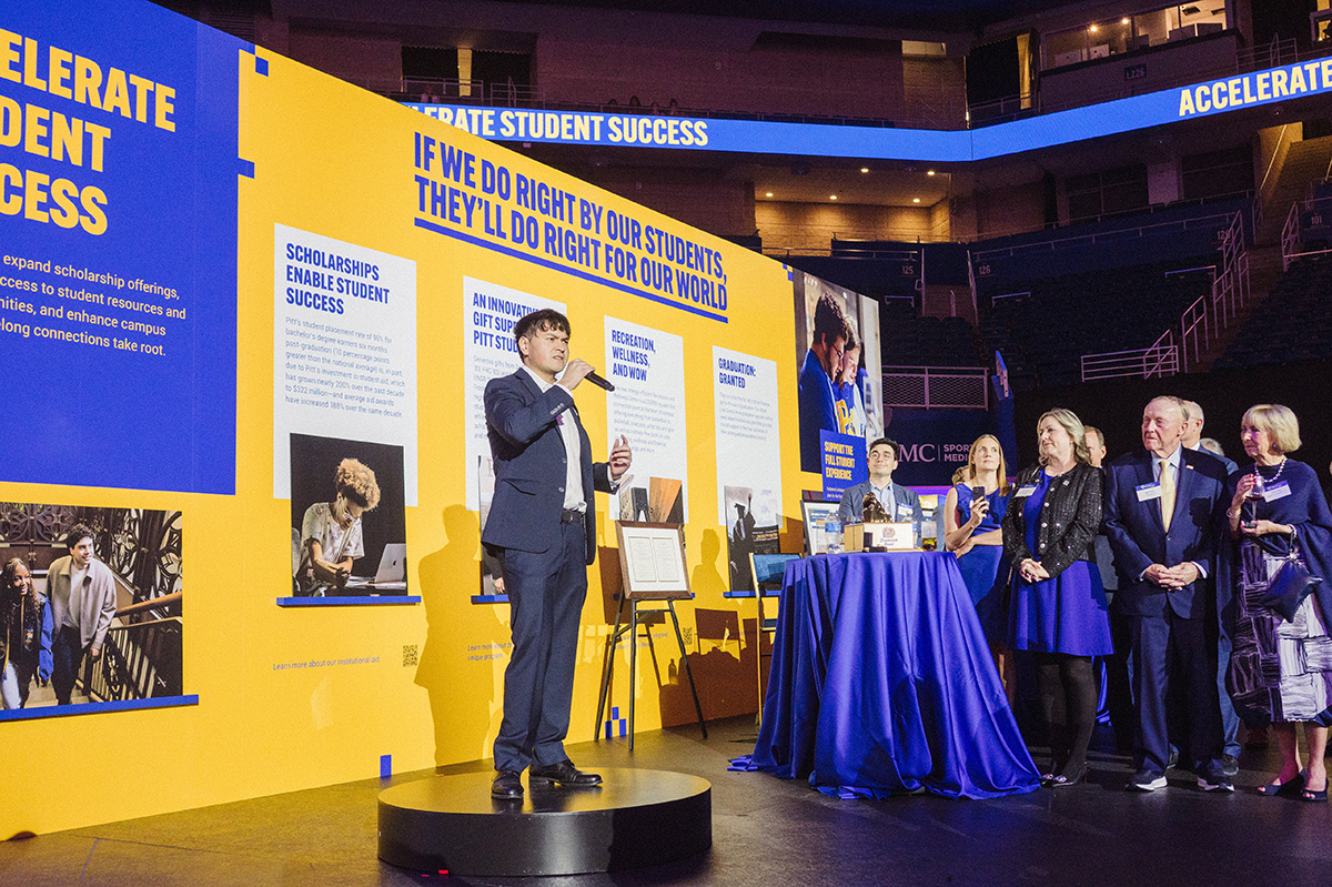 student gives presentation on Pitt's profound impact on his academic success